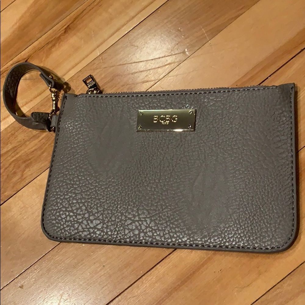 BCBG Paris gray pebbled wristlet. Gold logo. New
